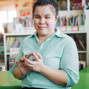 young blind person woman using smart phone